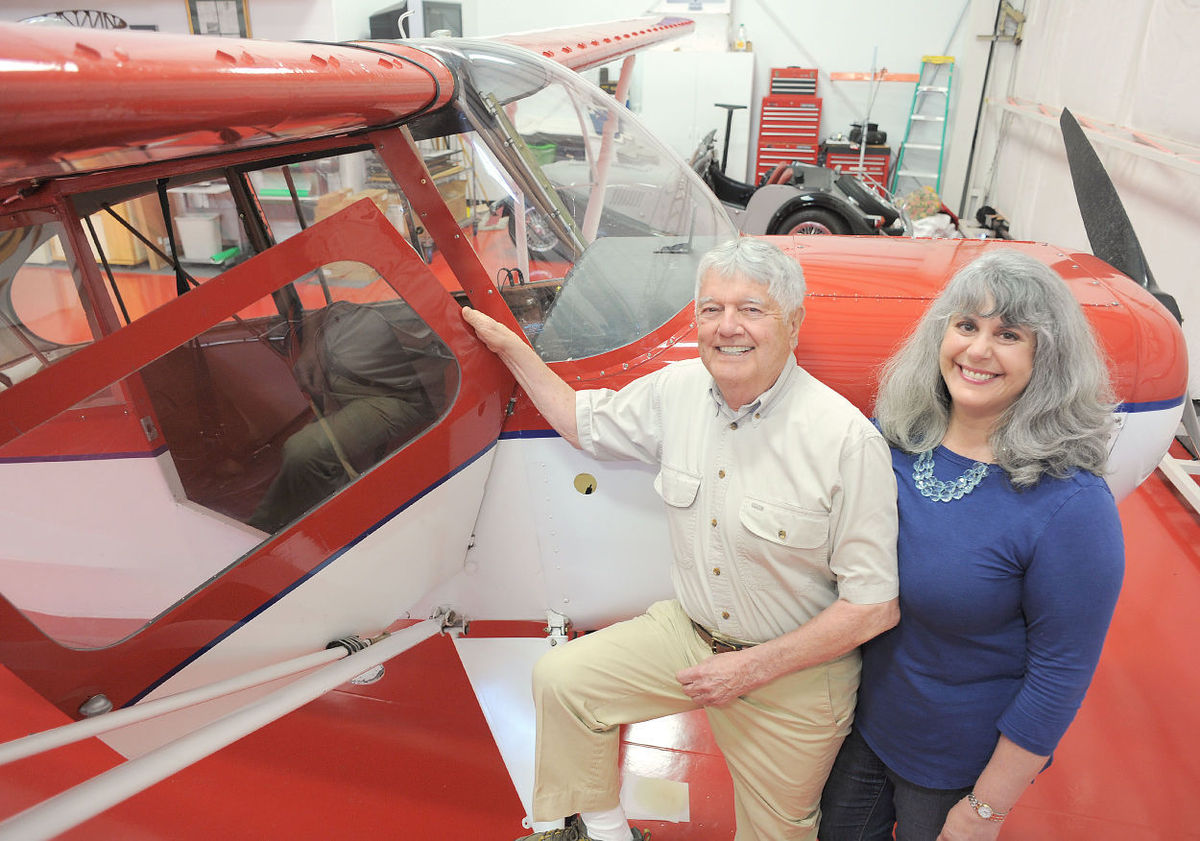 Charles White and Anni Brogan standing besides Aeronca 7AC with Micro Vortex Generators installed.